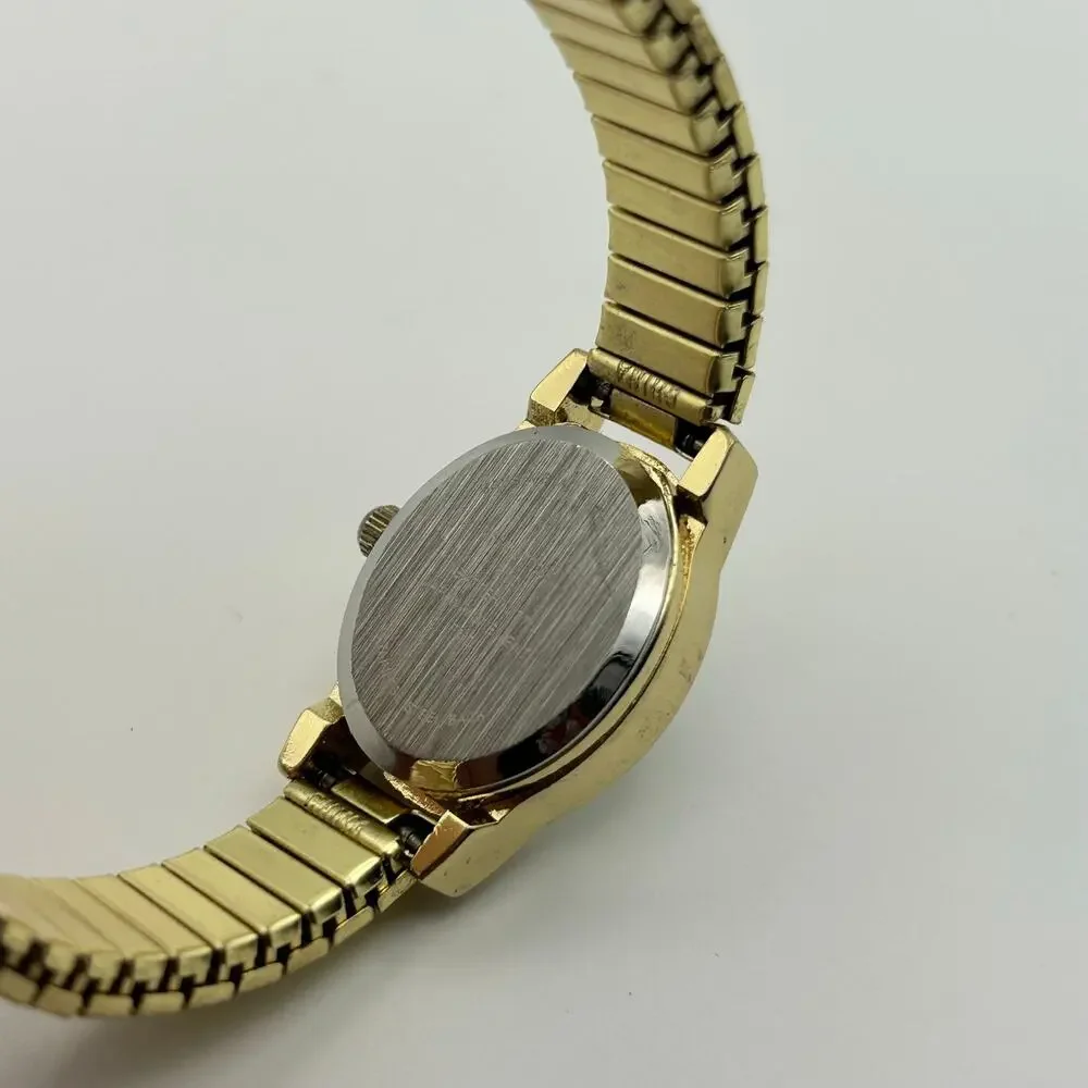 Gold-tone Oval Case Stainless Steel Stretch Band Women’s Watch Working